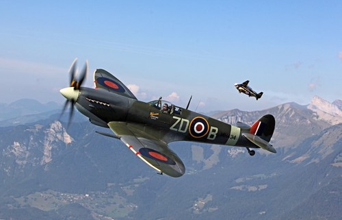 Yves Rossy (Jetman) flying alongside a Spitfire