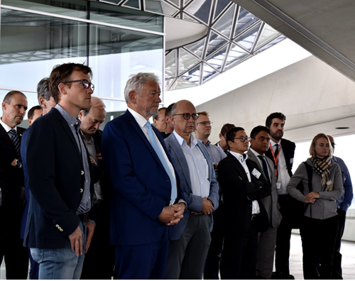 Second from the left: François Bellot - Belgian Federal Minister of Transport - watching the live demonstration on the bridge of the Port of Antwerp building