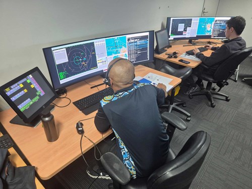 Image: Pseudo-pilot team operating Adacel’s MaxSim™ simulator remotely from Melbourne.