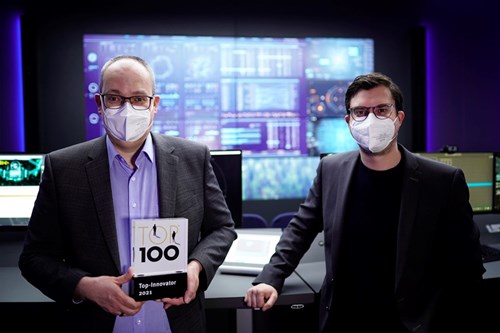 G&D CEOs Roland Ollek and Nils Strauch are excited about the TOP 100 Award.