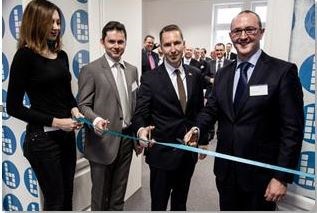 British Ambassador to Slovakia, His Excellency Mr Andrew Garth (centre) joins Helios Managing Director Nick McFarlane (right) and Slovakia Manager Juraj Jirků for the ribbon-cutting ceremony to celebrate the opening of the new Helios office in Žilina Slovakia